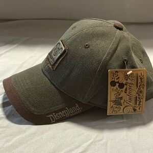 Disneyland, Size Adult, Green with Disney emblem, NWT, ( New with Tags ).